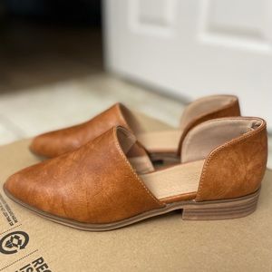 Brand new, never worn. Size 6.5 women’s